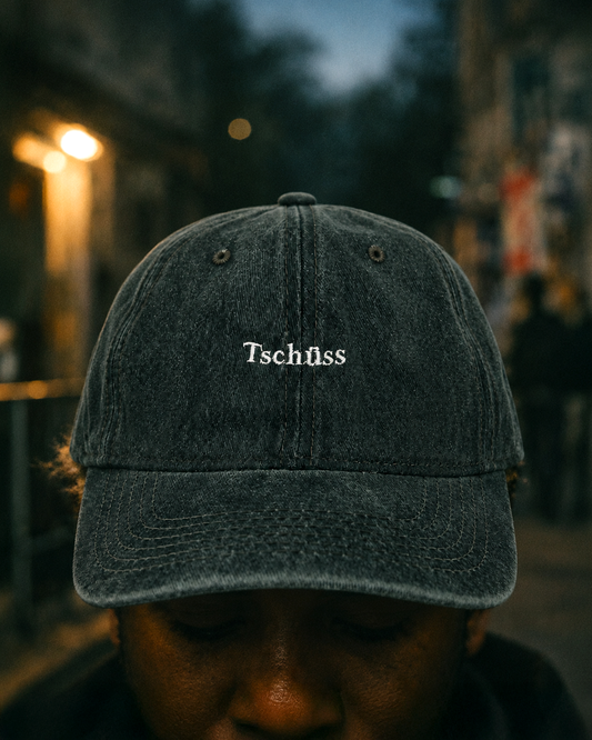 Tchüss